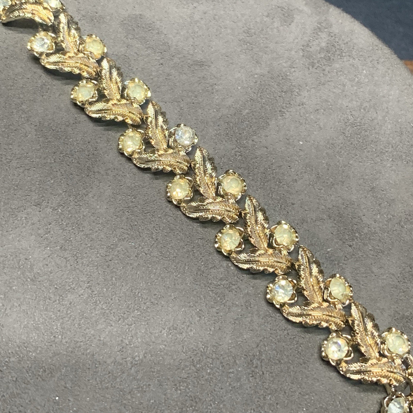 Vintage Coro 7.5” Bracelet Textured Gold Tone Leafs Rhinestones Fold Over Clasp