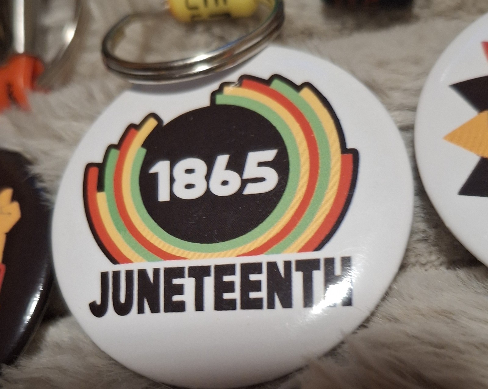 Juneteenth Celebration – Pins, Bracelet and Key Rings. 12 Items.