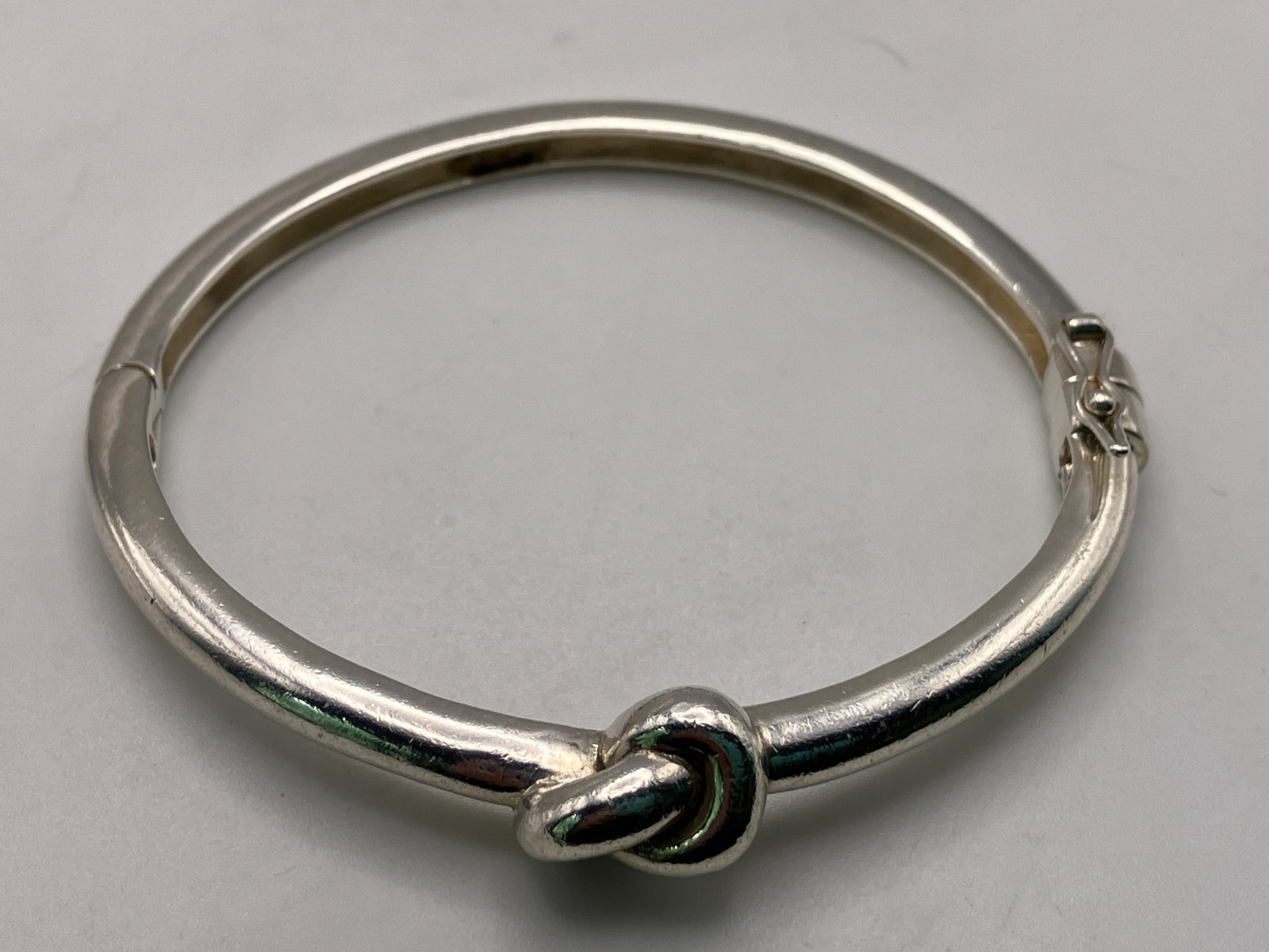 Sterling Silver Heavy Love Knot Hinged Bangle with Magnetic Closure Safety Latch
