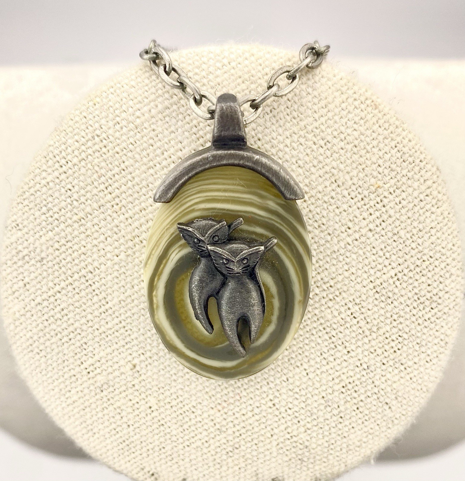 Two Walking Cats Pewter Pendant Semi-Transparent Khaki Green Acrylic Backdrop
