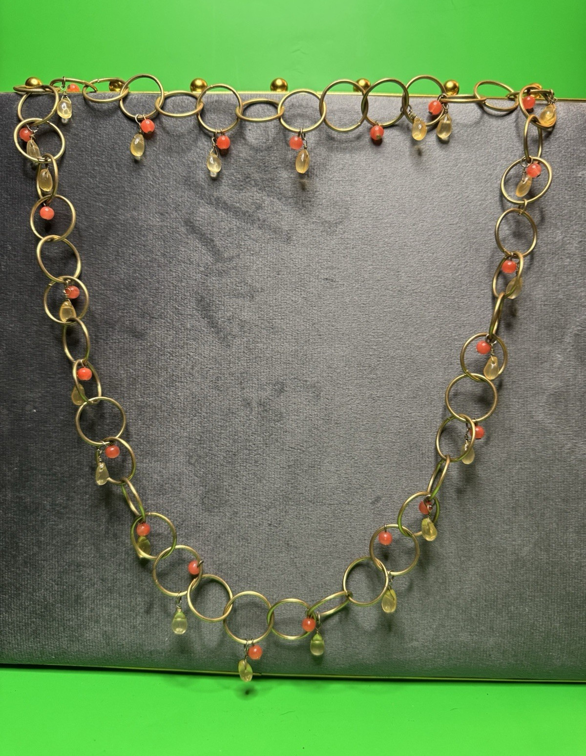 Gold Tone Metal Oval Link Chain Necklace with Orange Round Beads, Dangle Charms