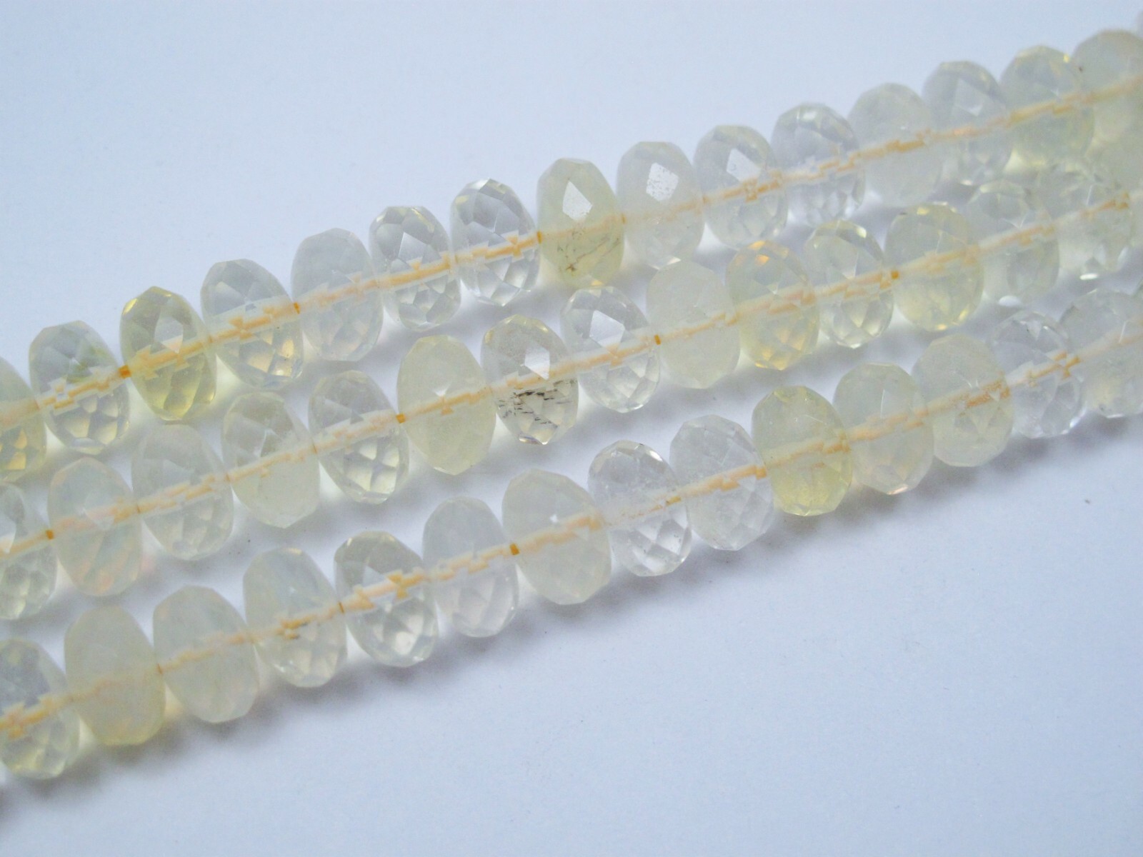 Pineapple quartz faceted roundell beads. 8mm,10mm Light yellow quartz beads.