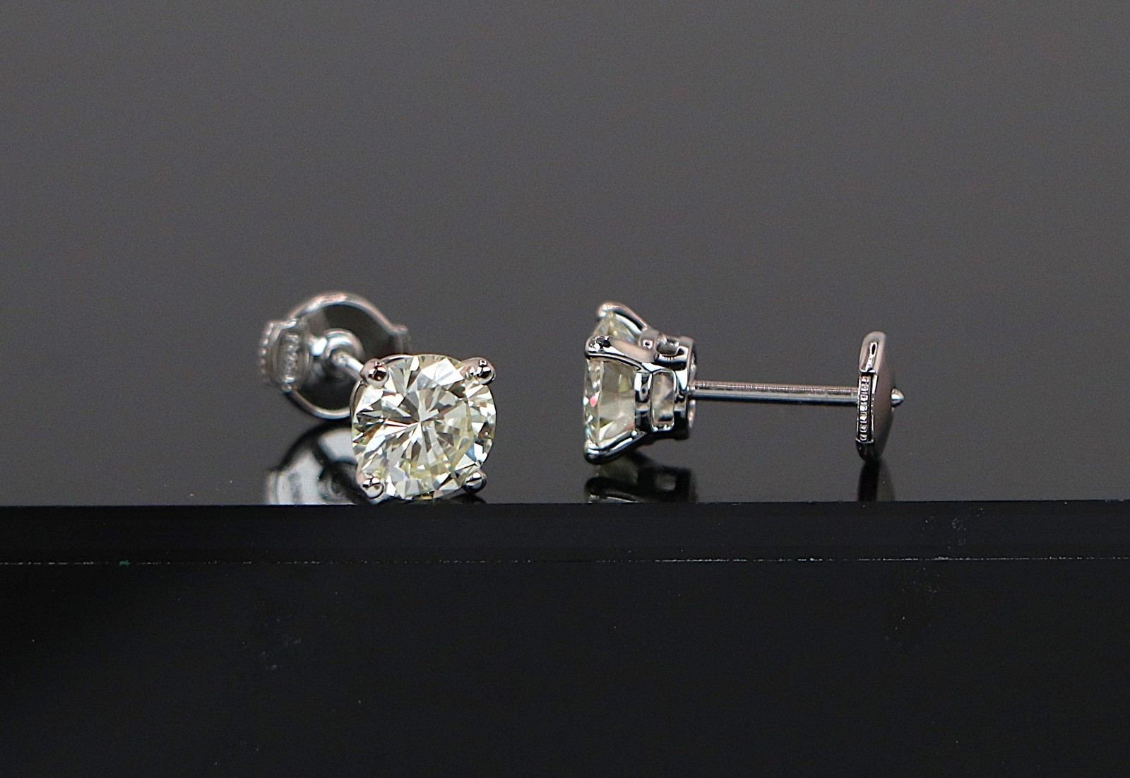 $12,000 Platinum GIA 2.20ct VS1 Round Cut Diamond 4 Prong Basket Stud Earrings