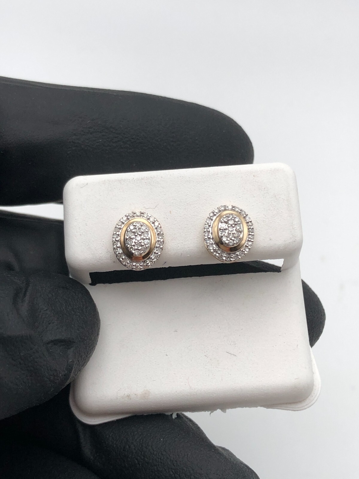 Oval Shaped 10k Yellow Gold Earrings with 0.20ctw of Diamonds 1.1 gram