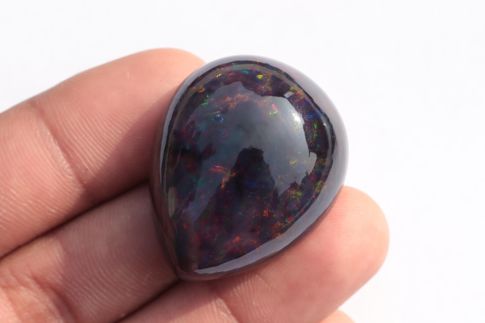 59.95 Carat Ethiopian Black Opal Cabochon 31x26x15 MM Pear Shape Welo Fire Opal