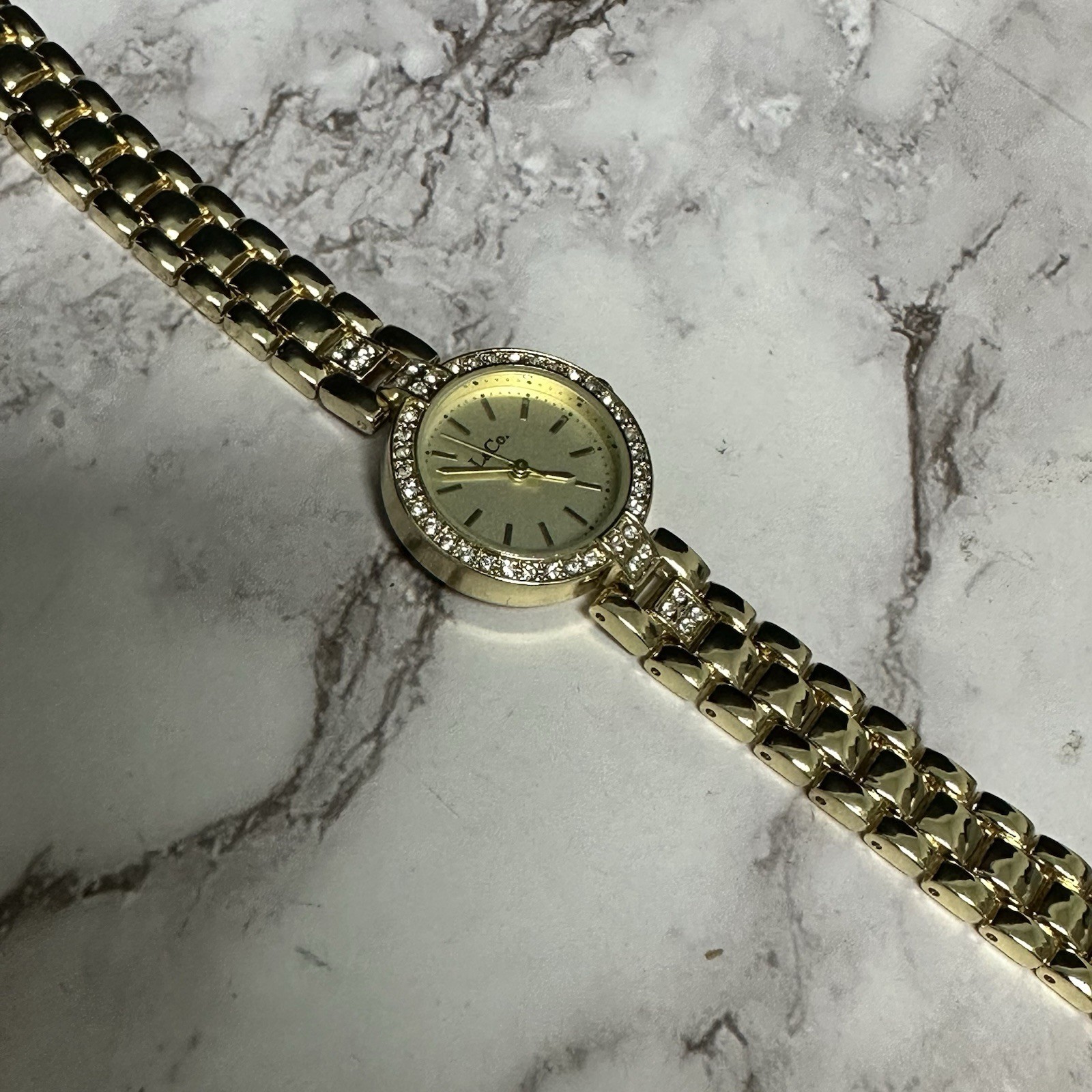 L & Co Watch Women Gold Tone Round Dial Crystal Bezel New Battery 7.25″
