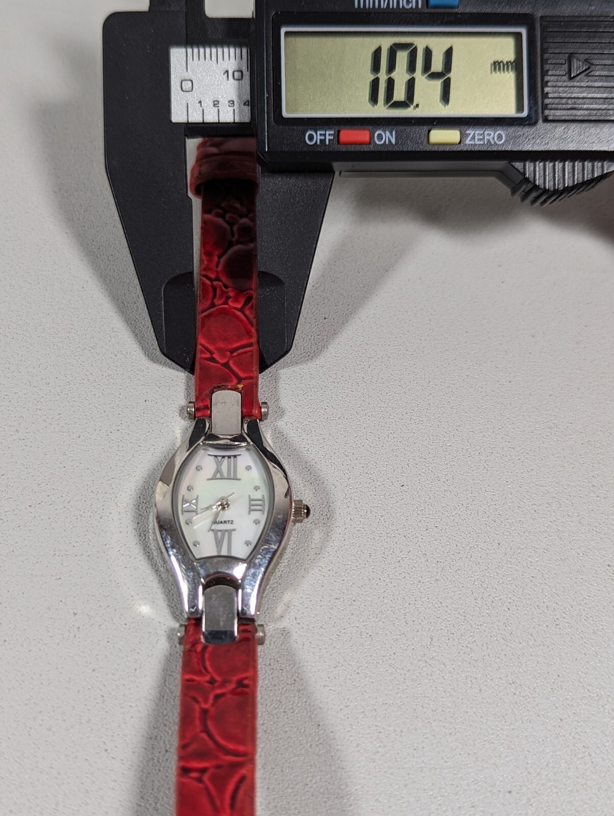White Pearlized Dial Silver Tone Rectangle Case Red Leather Band Watch 7.25 In