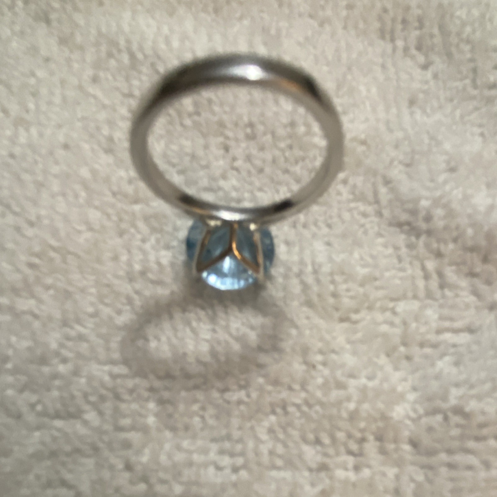 Round blue topaz petal prong, silver tone size 7