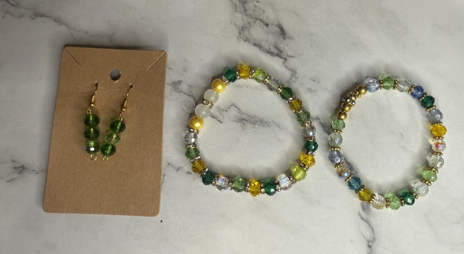 handmade beaded earrings and bracelets set green, yellow, blue and wht beads