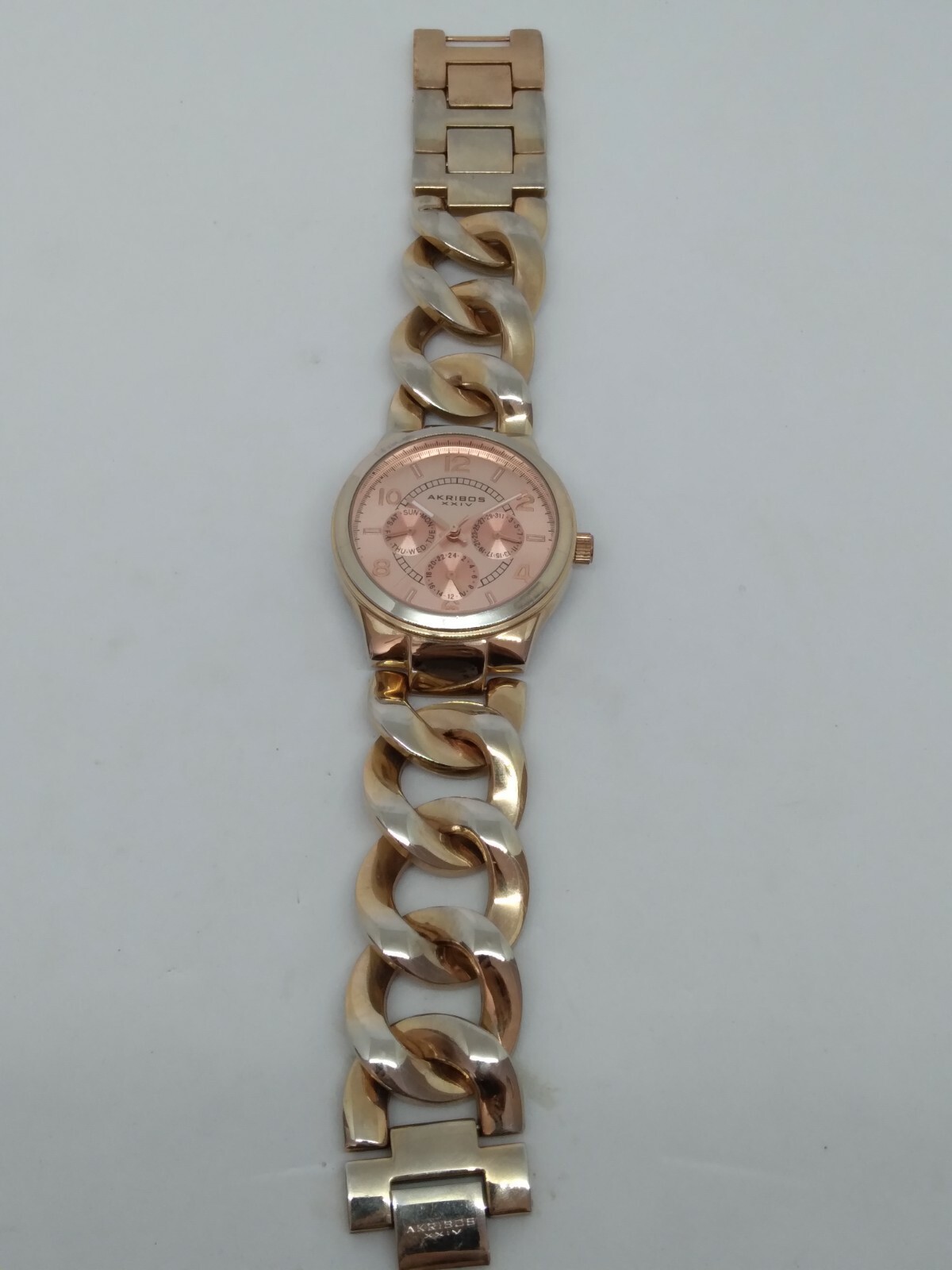 Akribos XXIV AK531RG Women’s 38mm Rose Tone Crystal Accent Multifunction Watch