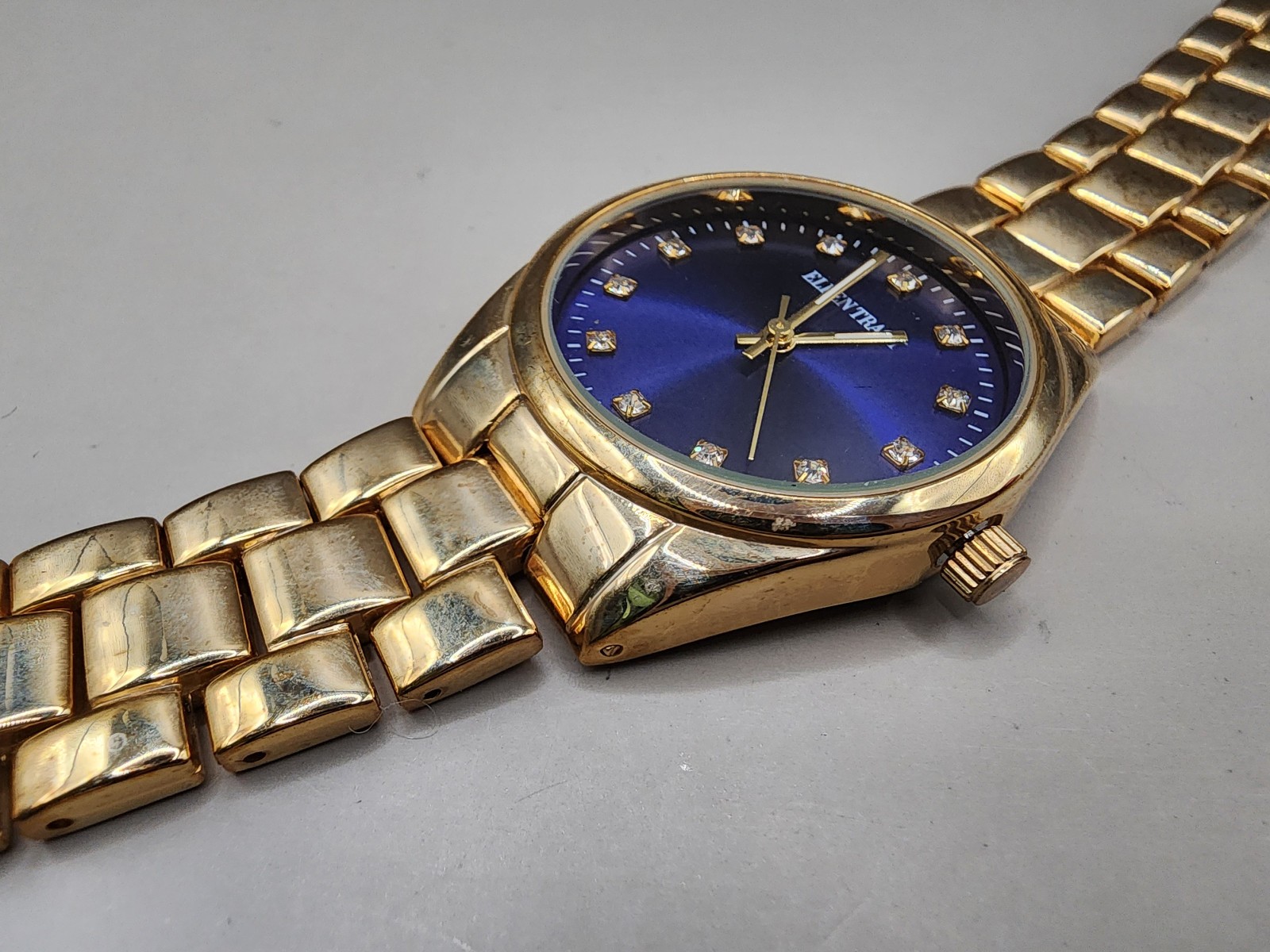 Ellen Tracy Women’s Gold Tone Watch Blue Sunray Dial Crystal Markers ET5198GDNV