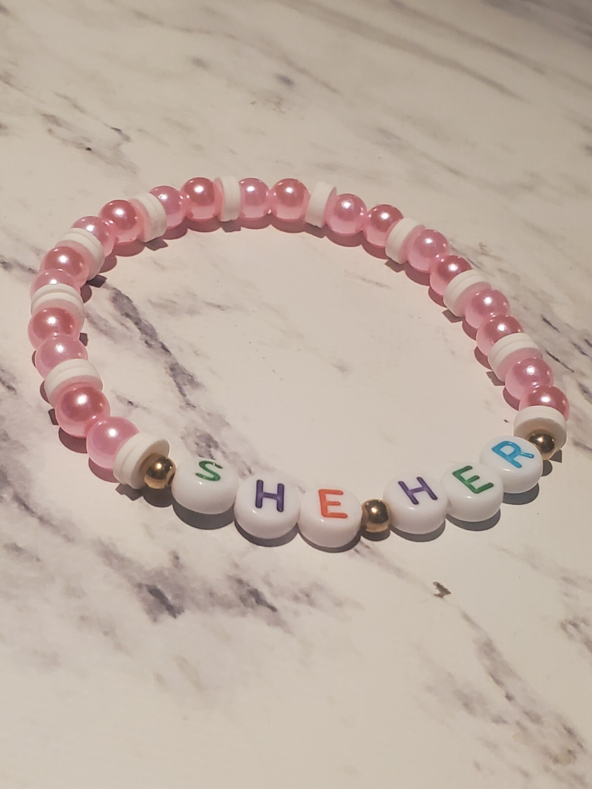 Handmade “She Her” Pink & White Beaded Bracelet