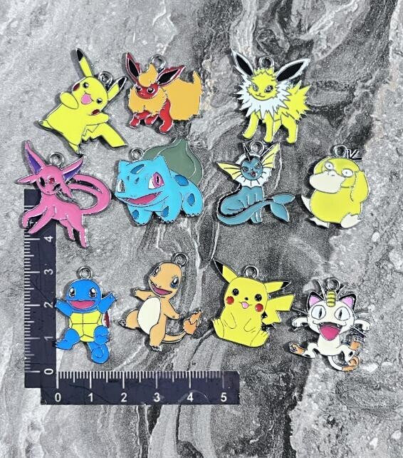 new 50Pcs Anime cartoon mix Charm bracelet necklace Pendant DIY Jewelry Making