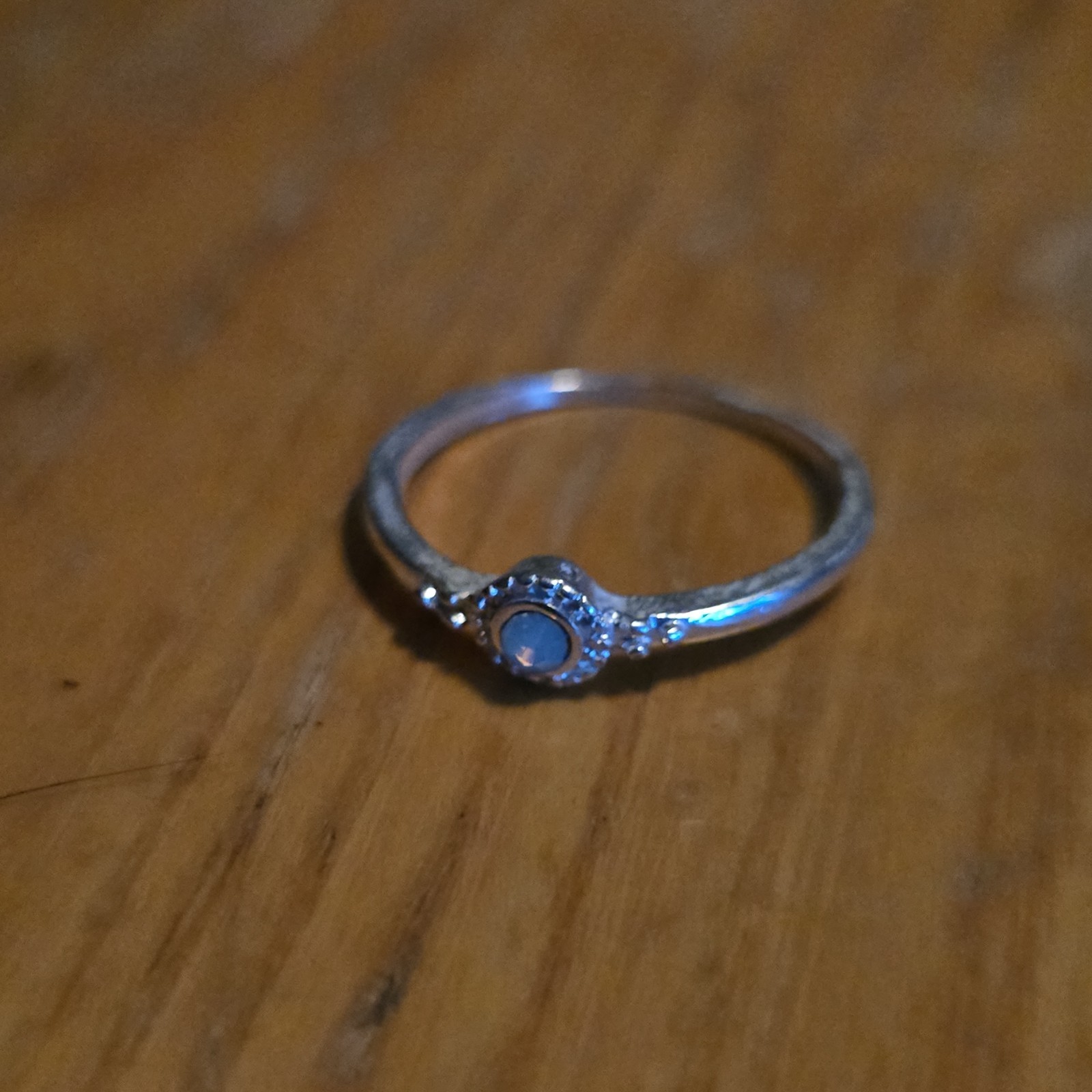 Silver Tone Metal Band Ring Size 8.5 Round White Stone Clear Accent Stones