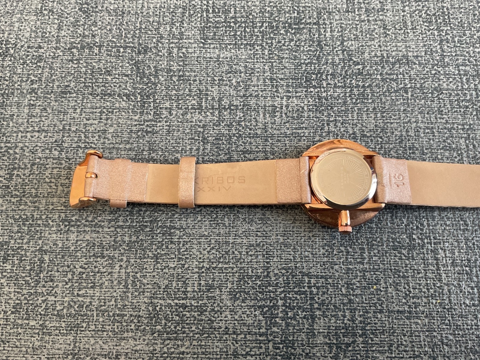 Akribos xxiv Diamond Dial woman’s wristwatch minimalist numberless