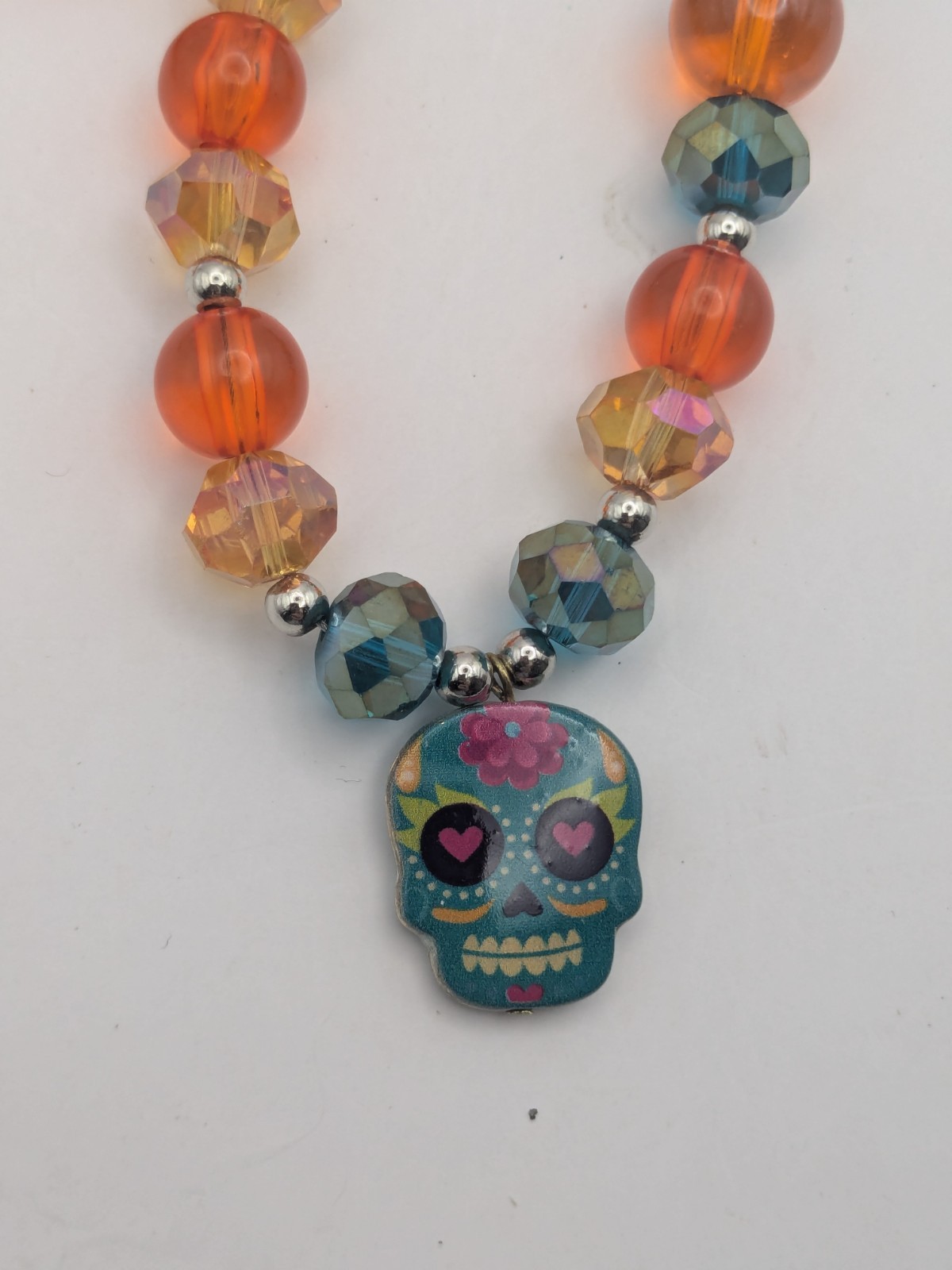 Turquoise And Orange Beaded Necklace With A Sugar Skull Pendant