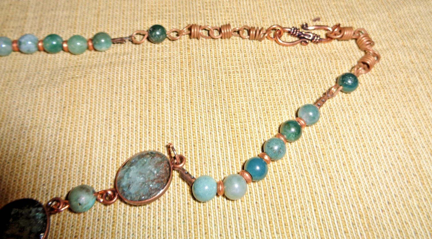 Artisan crafted, 19” crushed apatite in resin necklace, with agate connectors, a