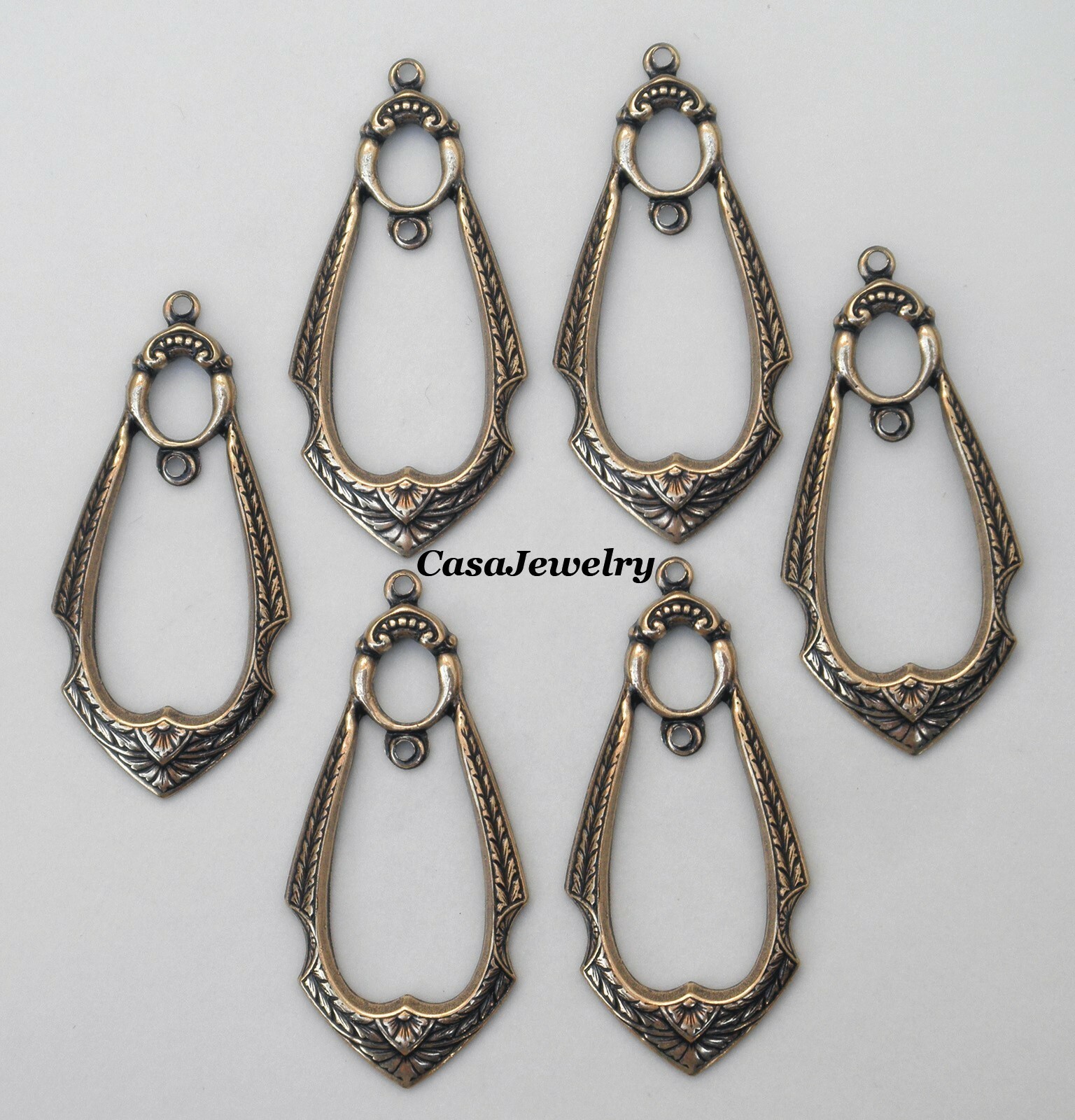 #1128 ANTIQUED GOLD OPEN DROP W/CENTER STATION & TOP HANG RING – 6 Pc Lot