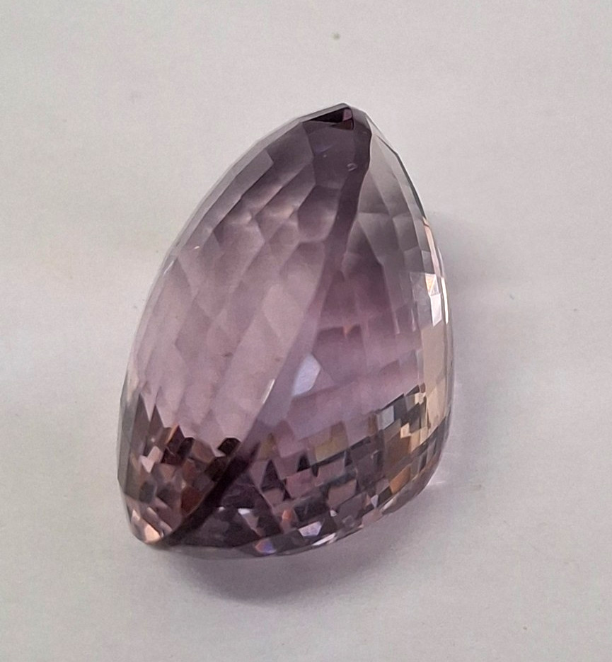 Large 84 carat Rose Cut Amethyst with a blur of facets plus GLI Certificate