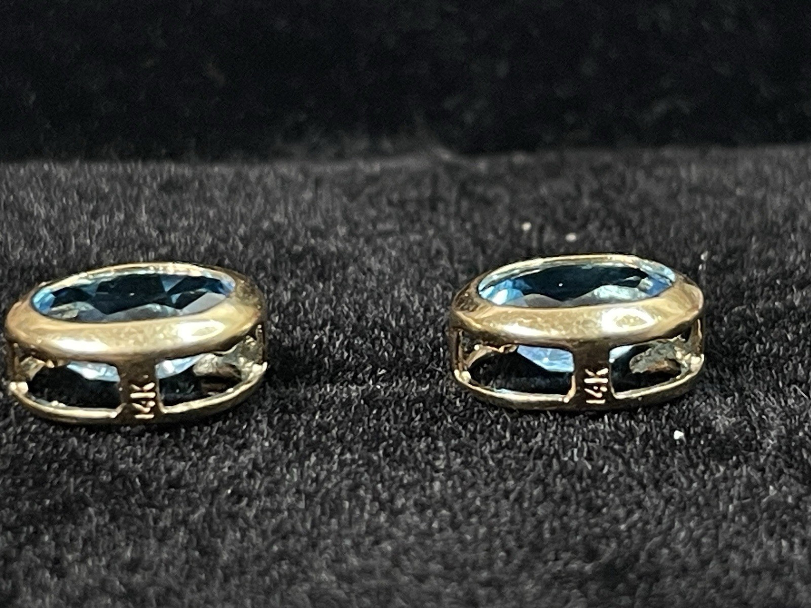 14k yellow gold oval blue topaz stud earrings. no clutch