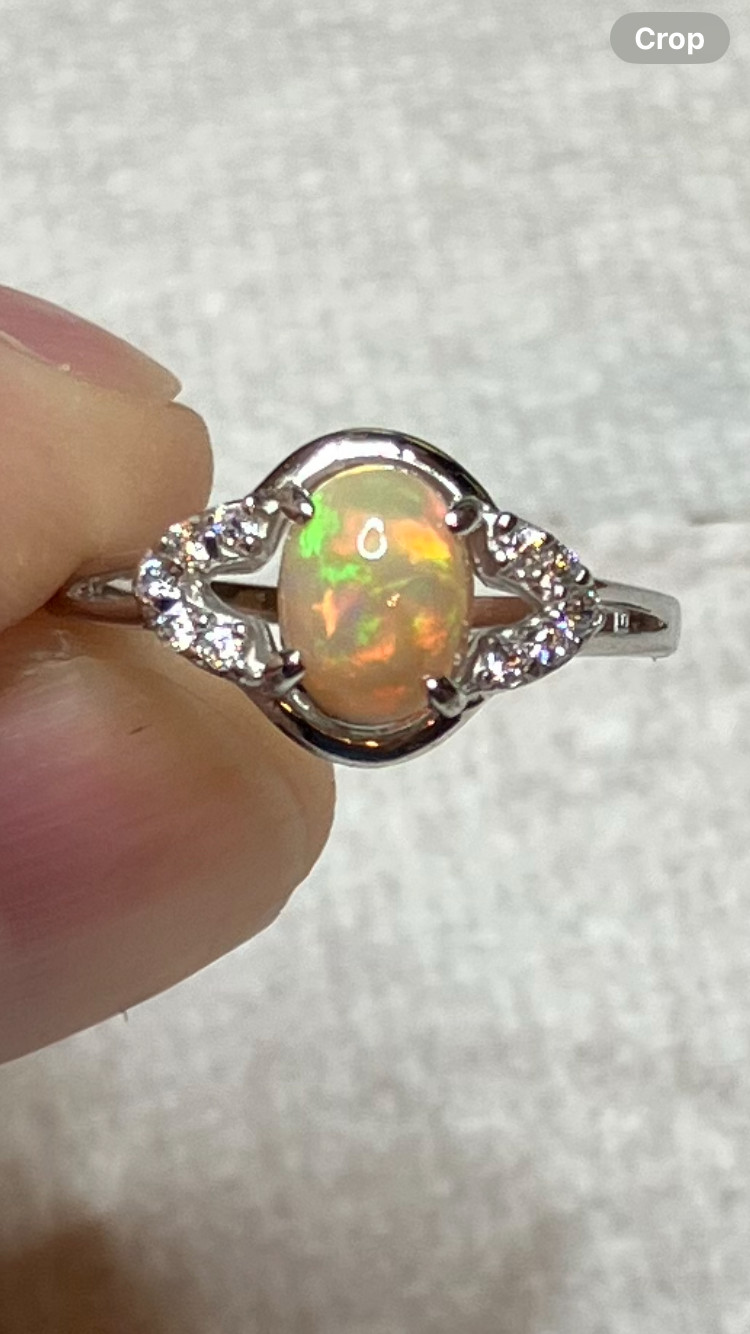 #138B- 0.95ct Genuine Ethiopian Welo Opal set in a Size 8.5 Sterling Silver Ring