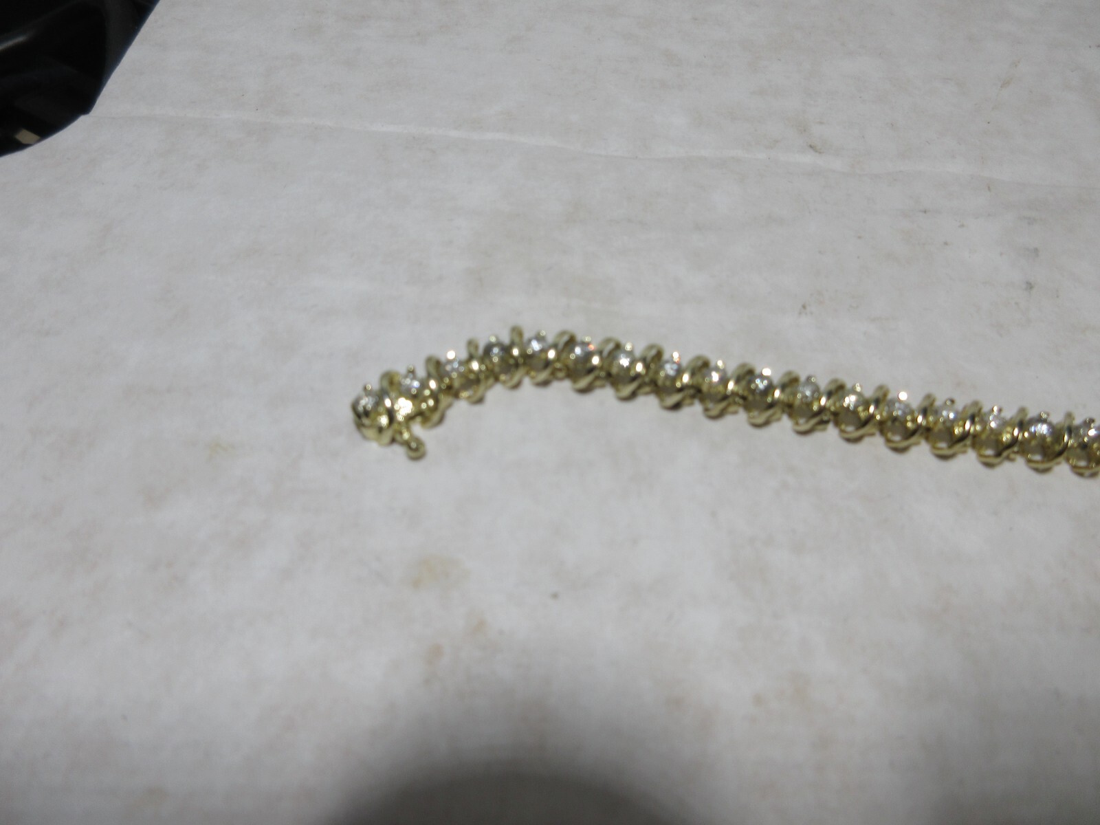 14K Yellow Gold tennis Bracelet, Wt 12.5g, locking 42 x 2.5mm diamonds si2 I1