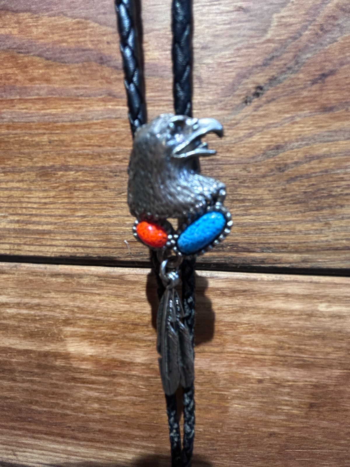 Eagle Head with Feathers Bolo Tie with manmade Turquoise and Ruby