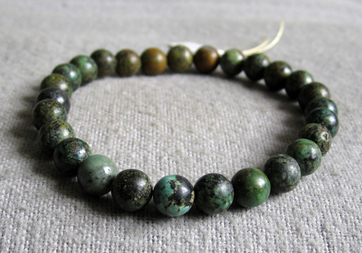 Armband aus Türkis / Tansania Kugeln Ø ca. 6 mm / 15-20 cm Weite elastisch