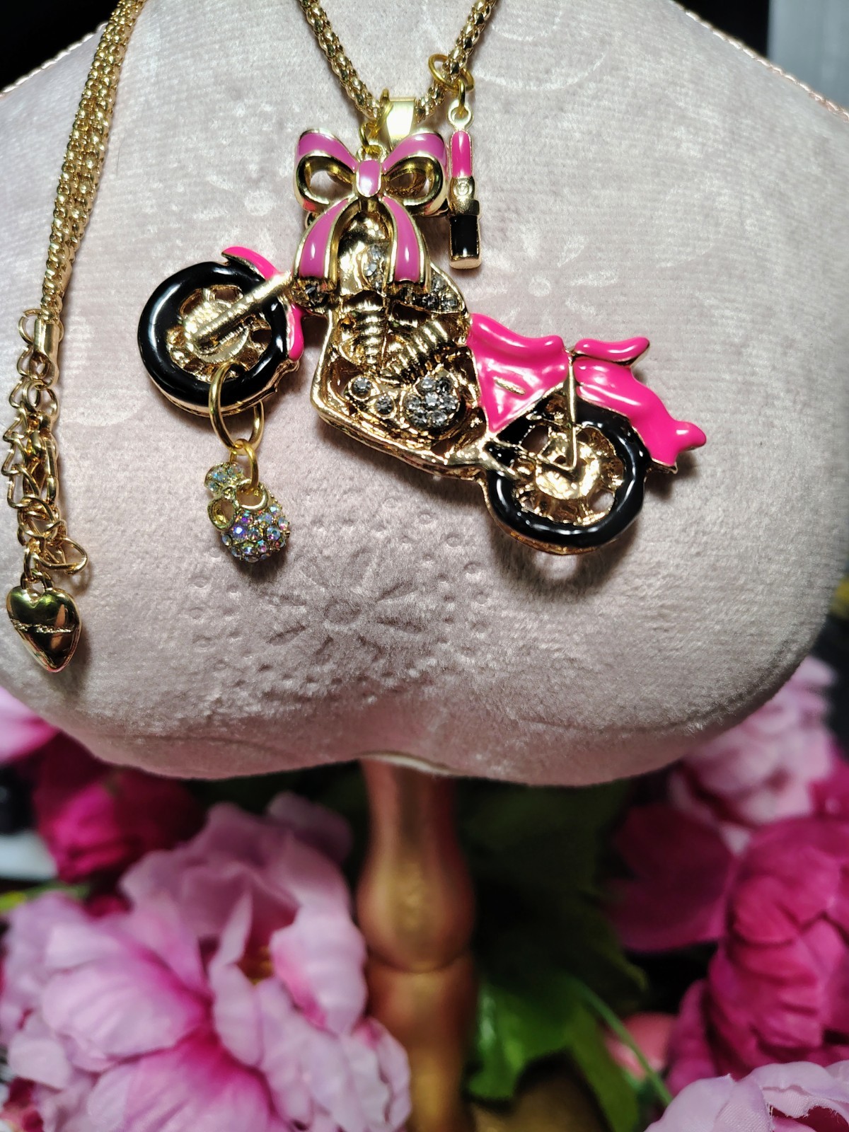 Betsey Johnson Pink Rhinestone motorcycle with BOW, SKULL, And LIPSTICK charms