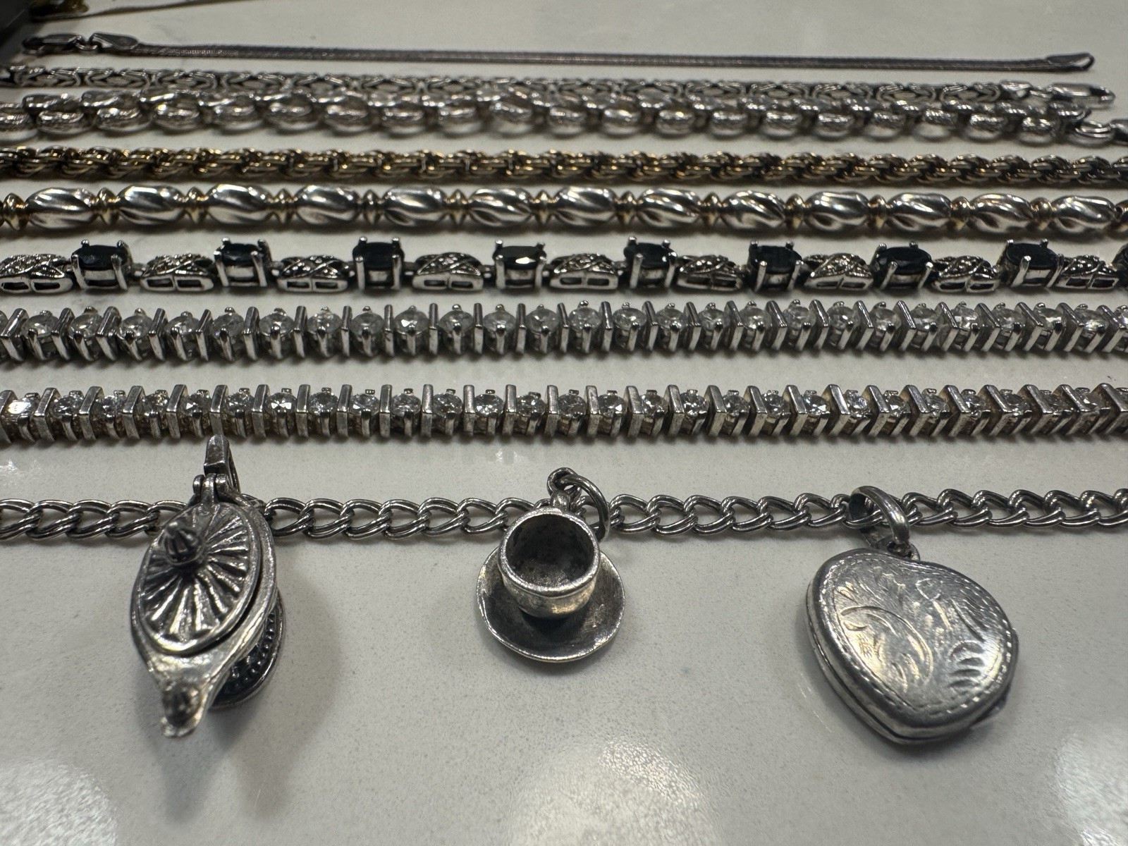 Sterling 925 7-7.5” Bracelet Lot of 9 – Melee, Tennis, Byzantine, Charms, more