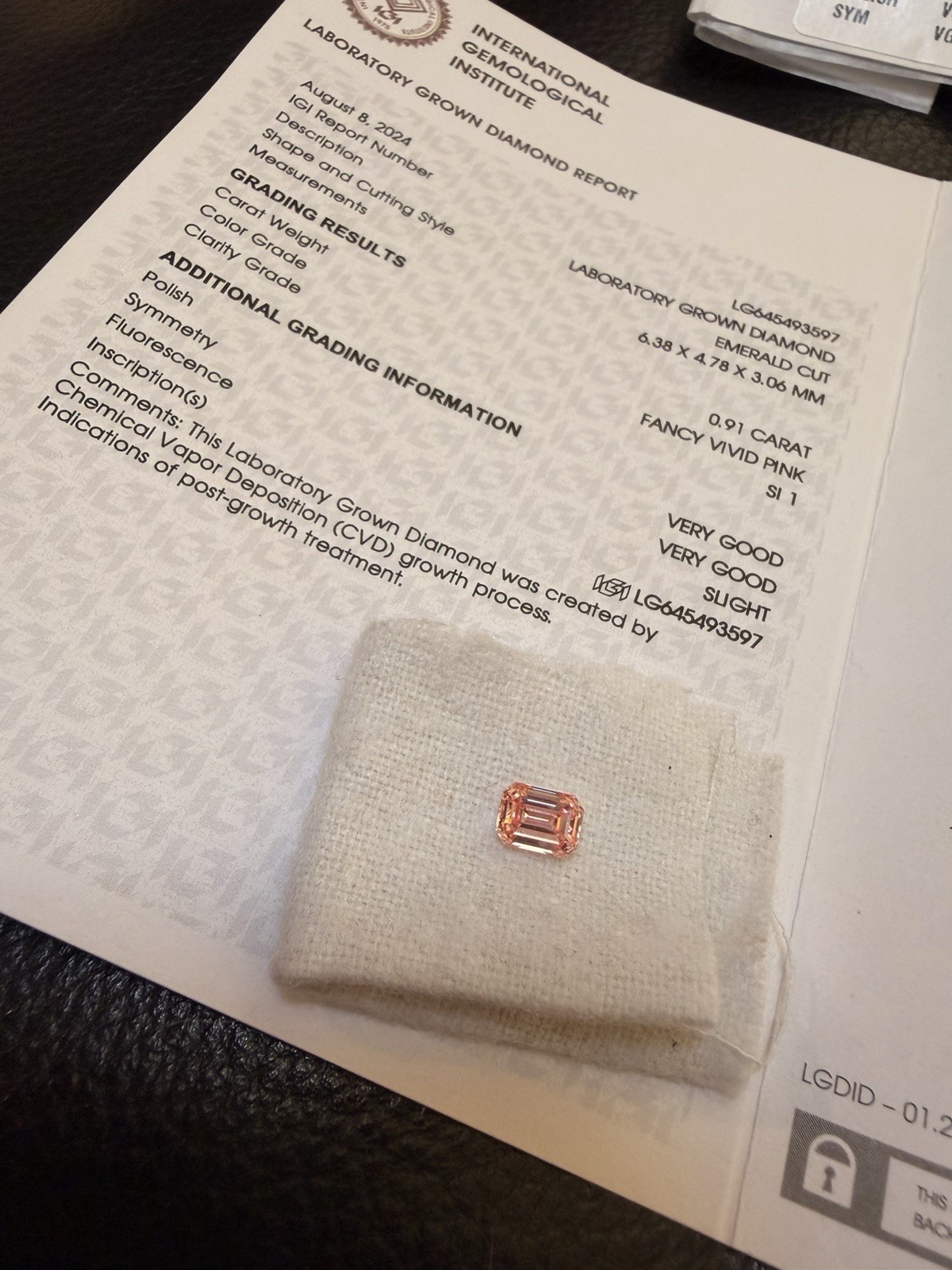 IGI Certified Lab-Grown Emerald Cut Diamond 0.91ct Fancy Vivid Pink SI1