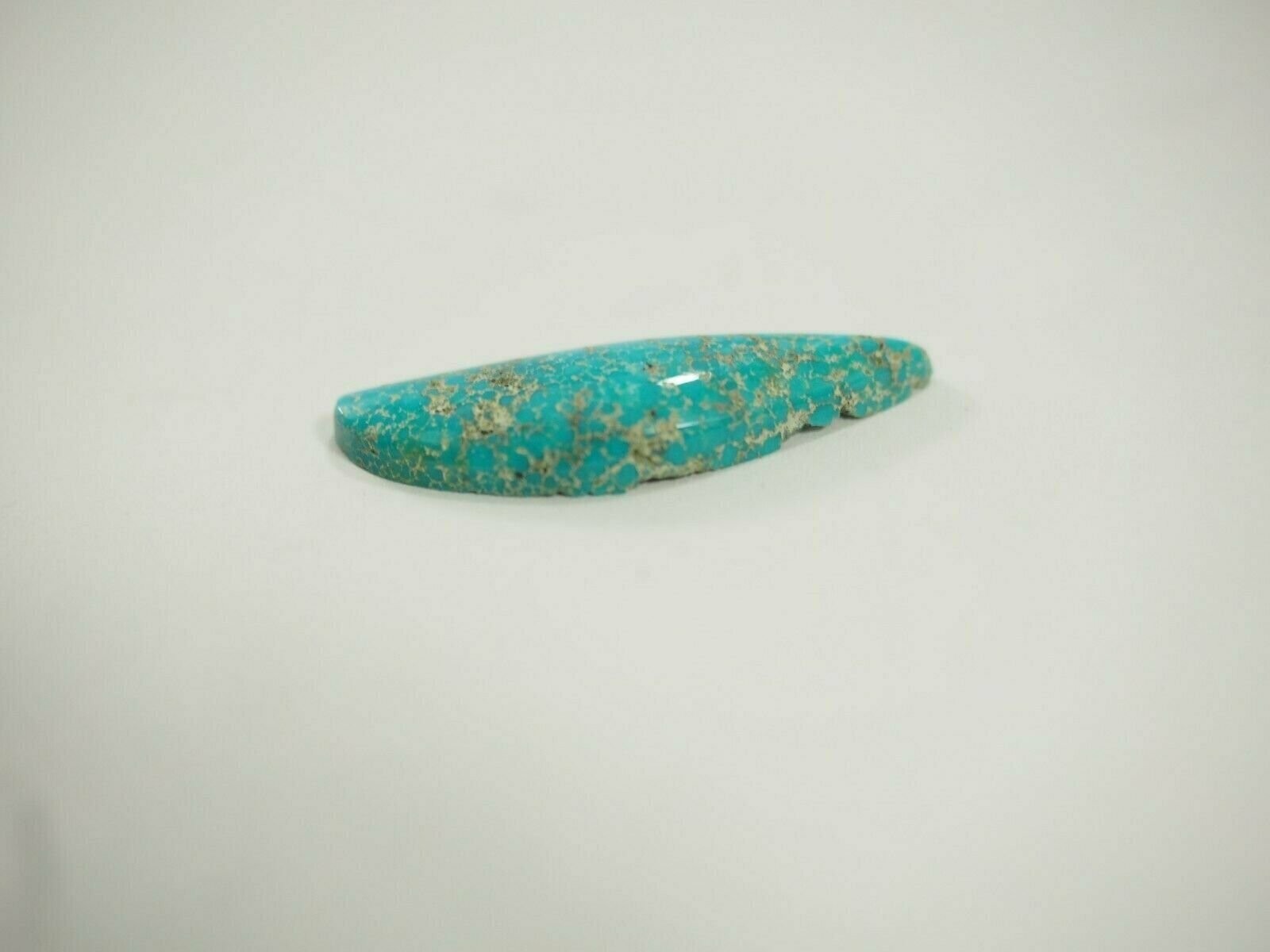 8.37 carat Turquoise Mountain freeform Cabochon 30.4 x 9.4 x 4.3 mm TC-58