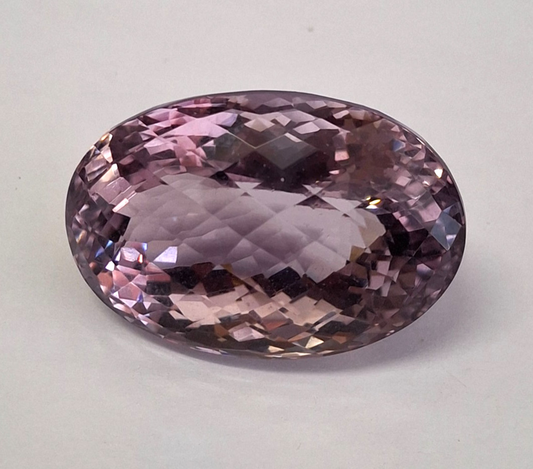 Large 84 carat Rose Cut Amethyst with a blur of facets plus GLI Certificate
