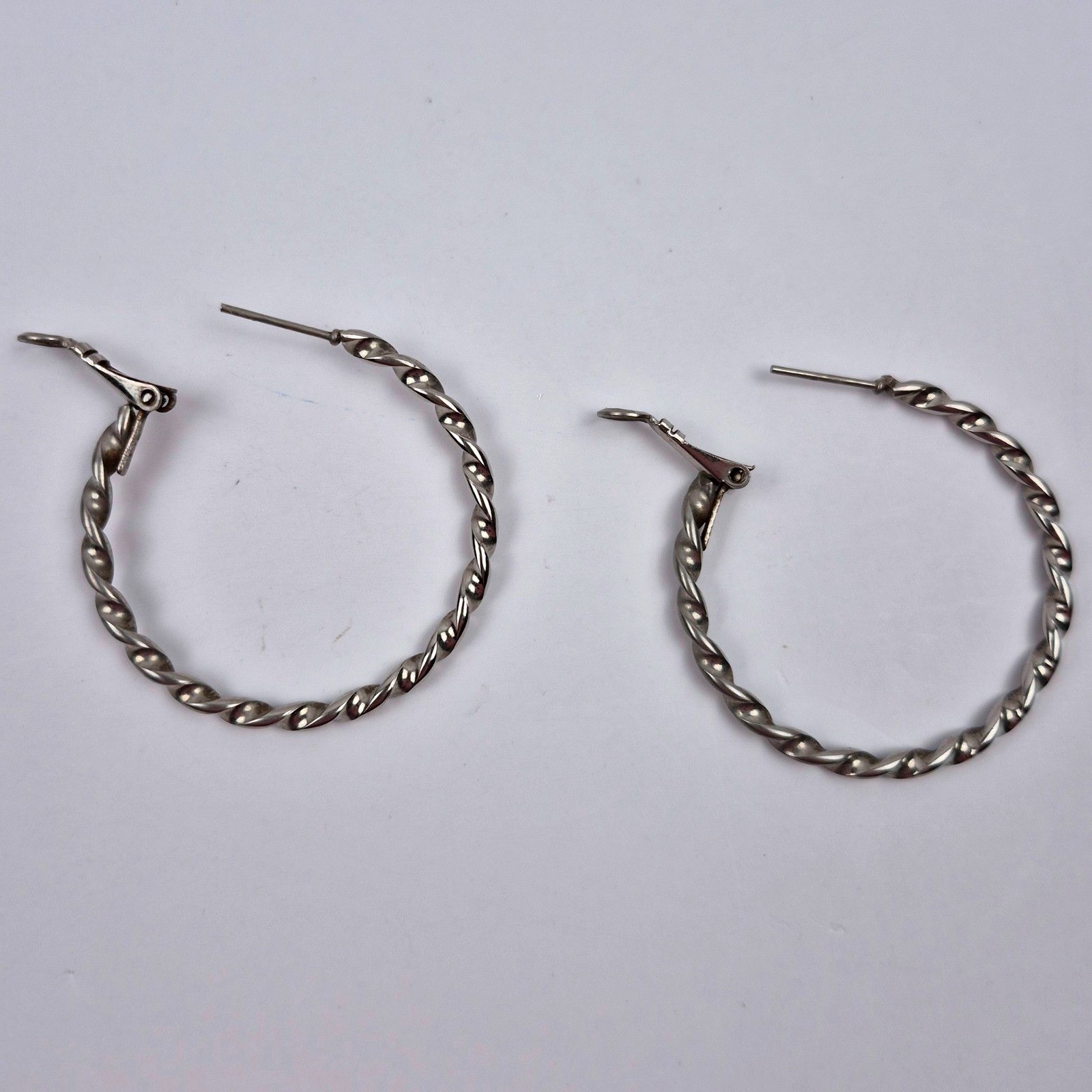 Silver Tone Twisted Hoop Earrings 1.5″ Latch Back Classic Fashion Jewelry Staple