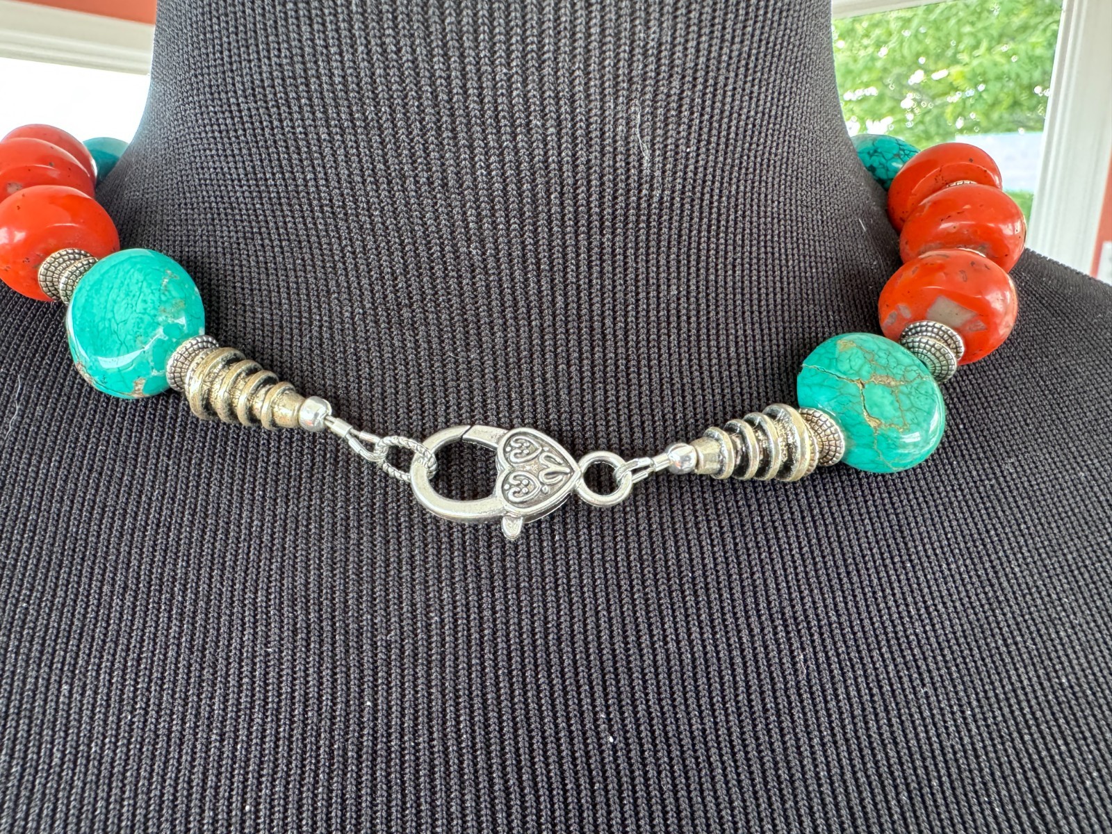 Silver Garuda pendant strung with natural coral and turquoise