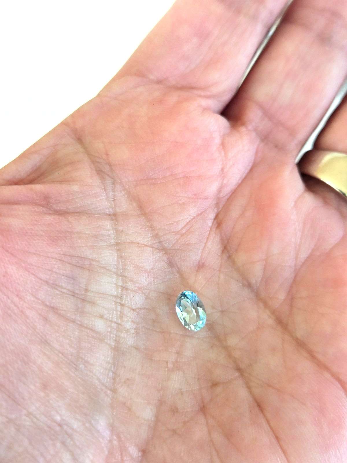 Vintage Blue Genuine Topaz 1.00 Carat Wt Oval 6x5x3.5mm Opex International Card