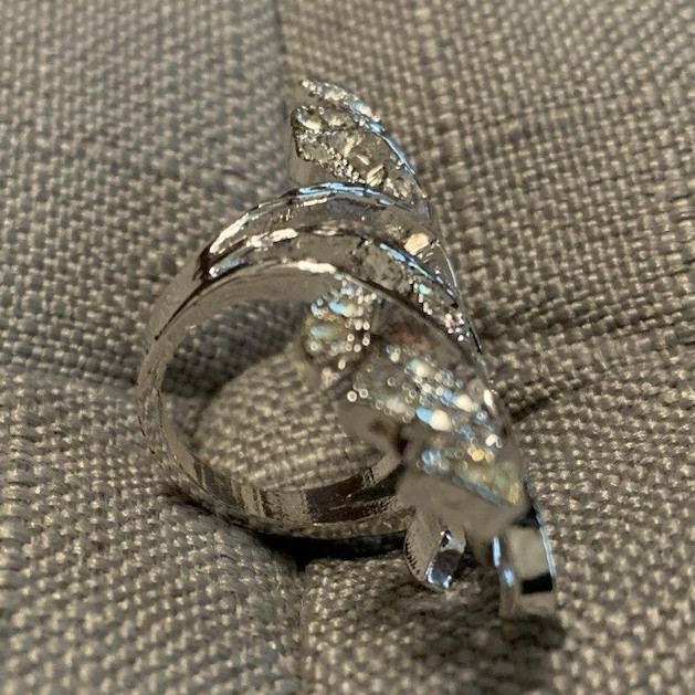 Love Knot Ribbon Swirl Cocktail Ring Size 7 Silver Tone Clear Round Stones