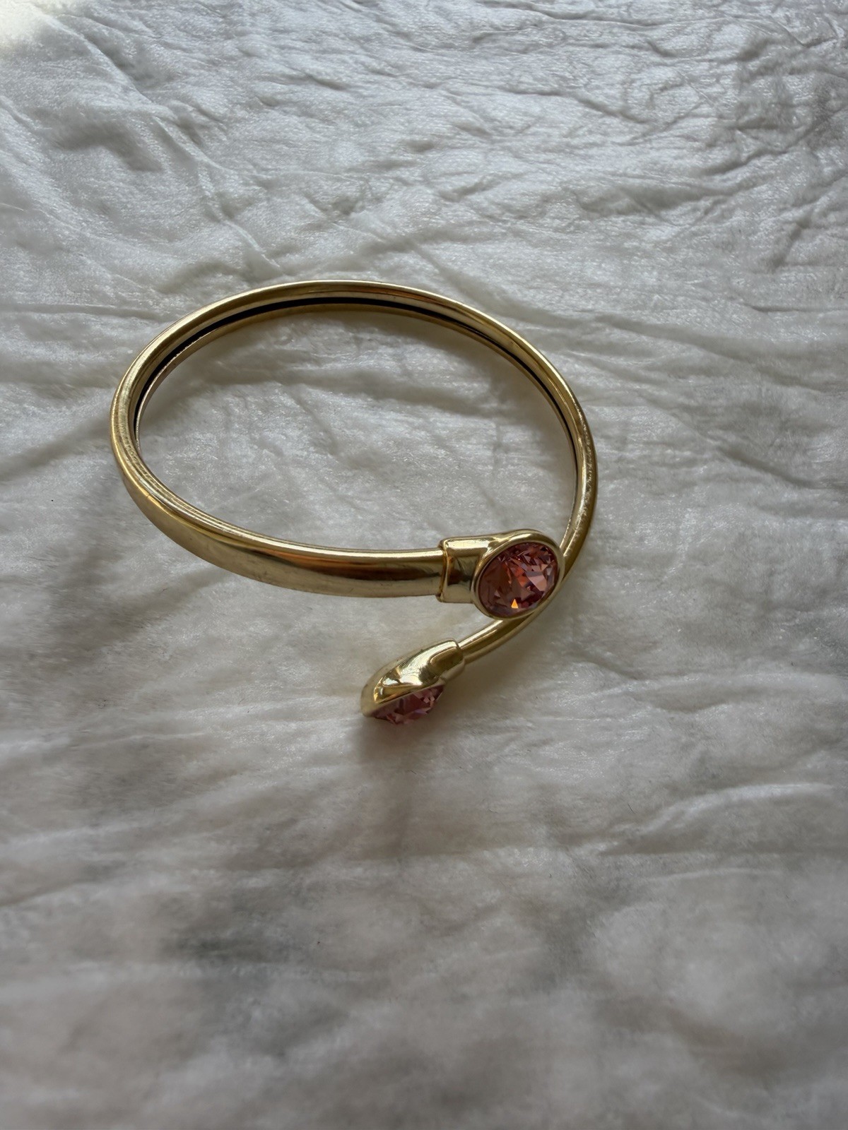 Goldtone Open-Ended Bangle Bracelet with Pink Gemstone Accents