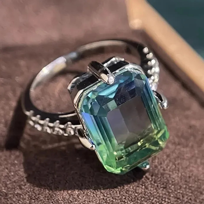 Luxurious Women’s Engagement Ring with Gradient Blue-Green Cubic Zirconia