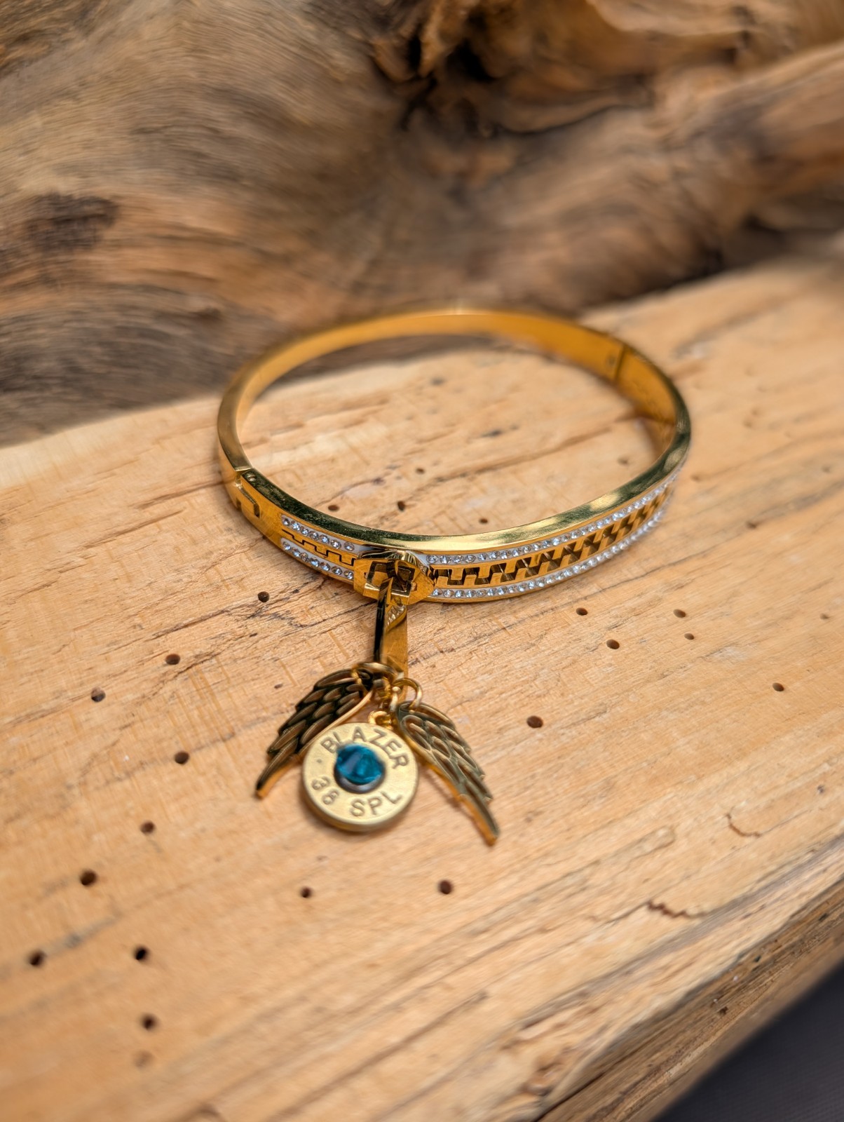Silver or Gold Stainless Zipper wing and Bullet Bracelet. Optional Glass Crystal