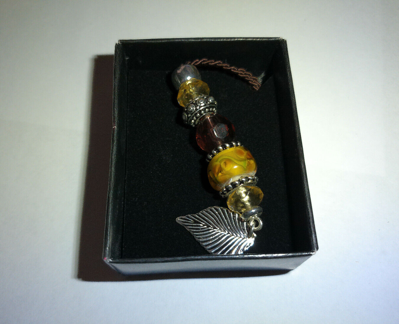 NEW IN BOX (BOX IS FLAWED), AVON BEADED CHIC Y NECKLACE- NATURE- BROWN