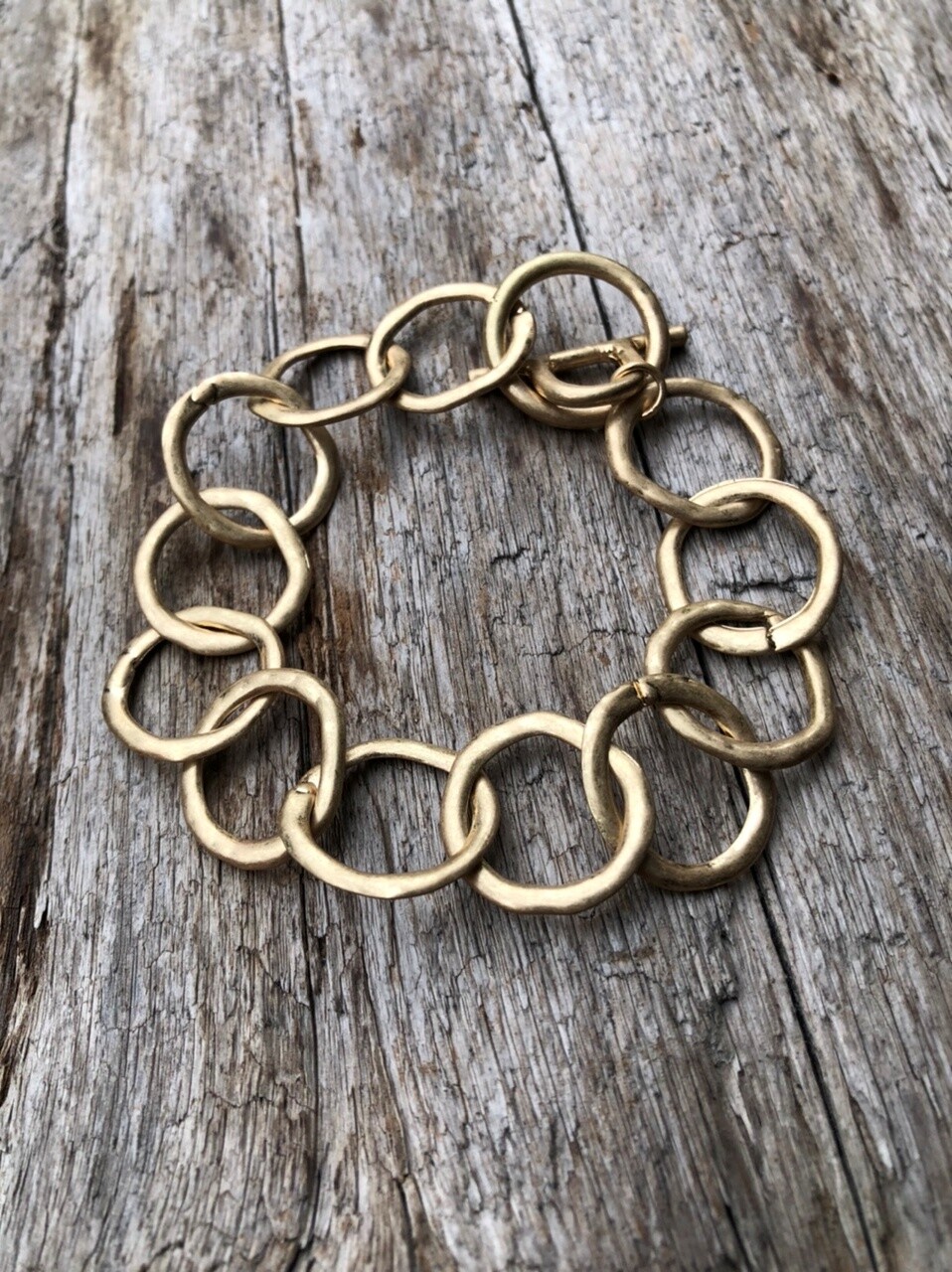Matt gold plated T bar Bracelet with linked connecting circles – Jalen G