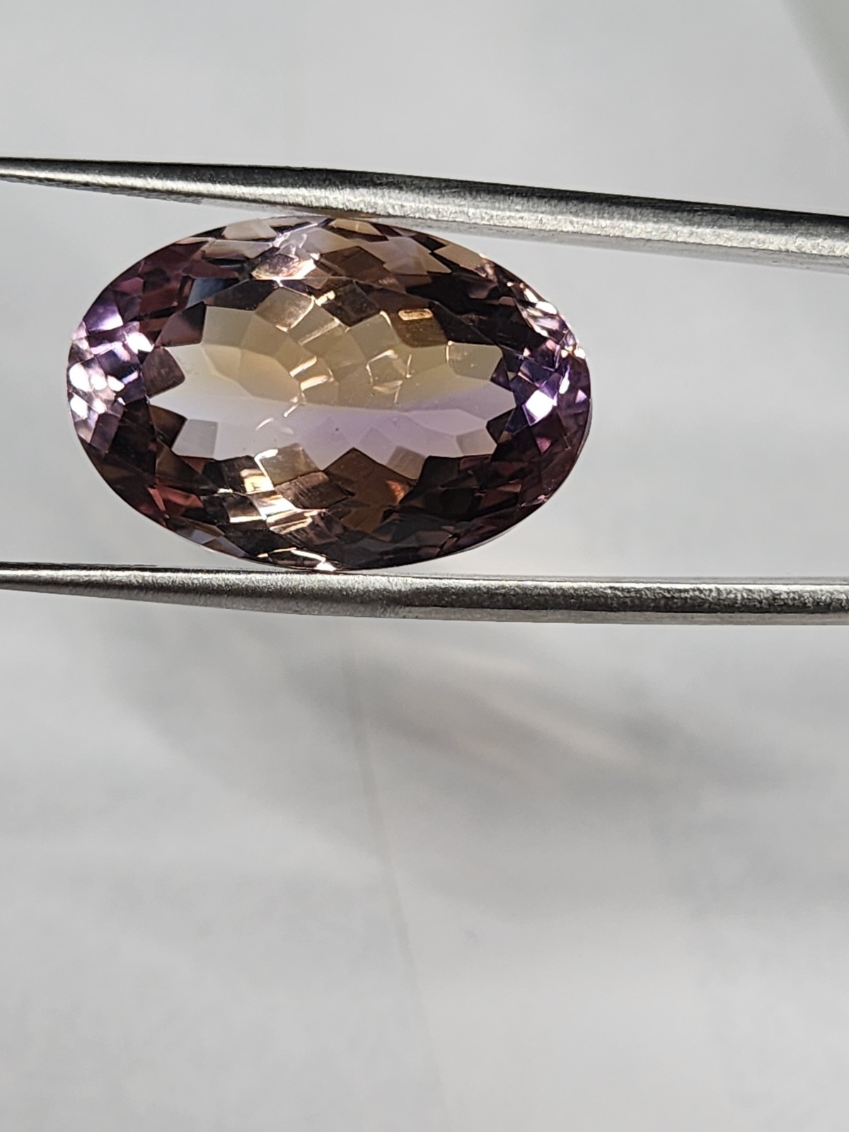 Natural Bolivian Ametrine 21.9ct Oval Cut BiColor Quartz 21.98×14.7×11.36 mm
