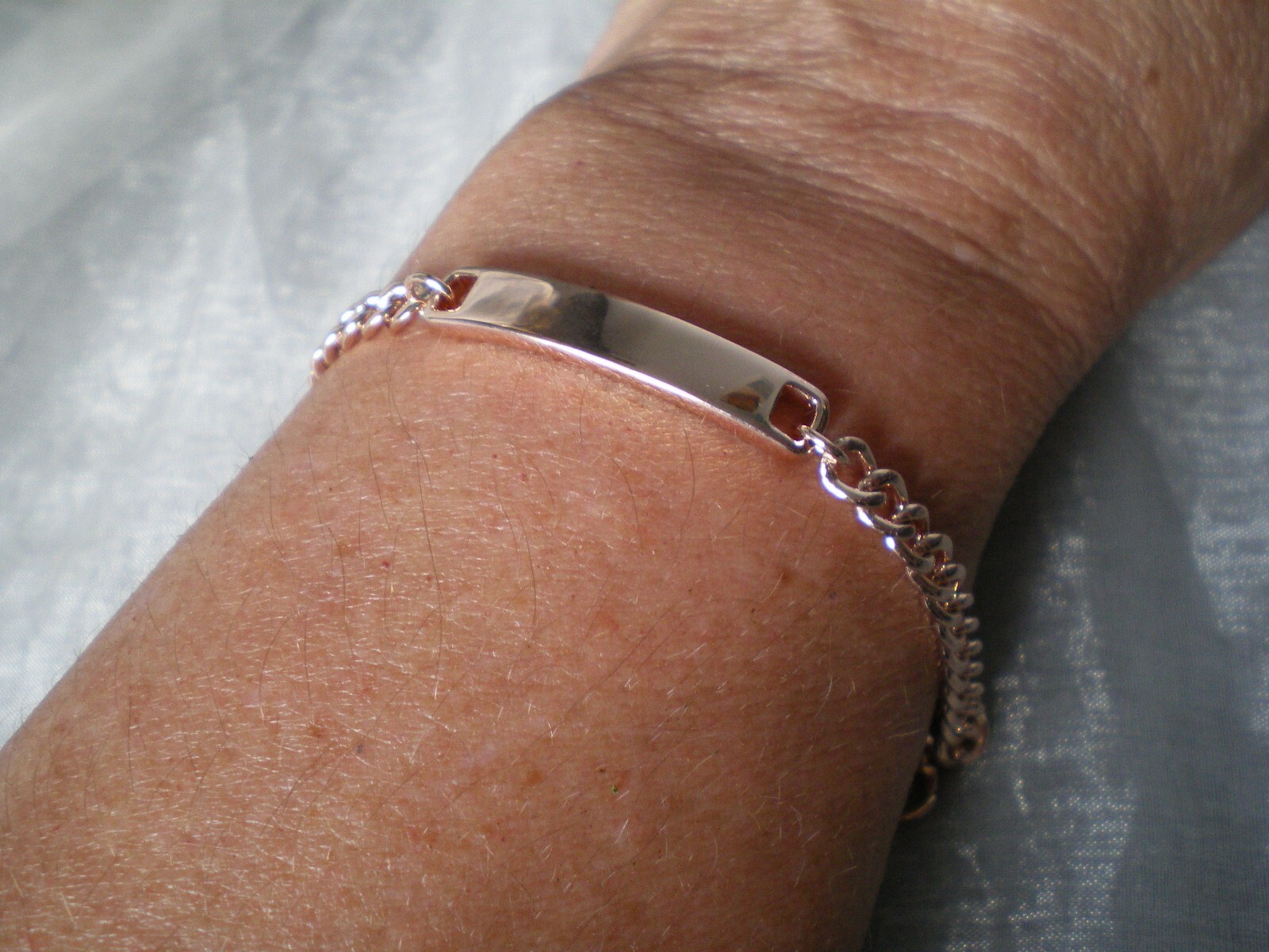 Identity bracelet, 8 inches, 11.68 grams of 925 Sterling Silver, Rose Gold over