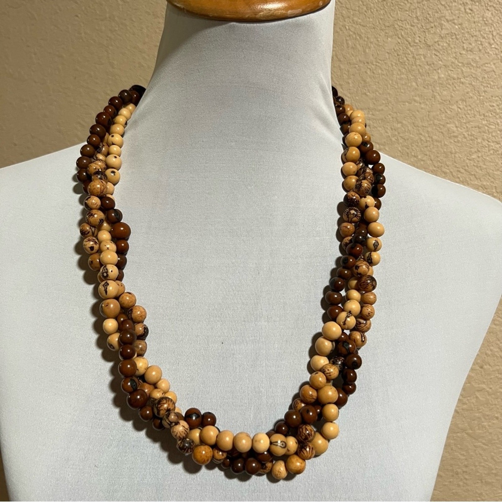 Beaded multiple twisted strands adjustable length necklace