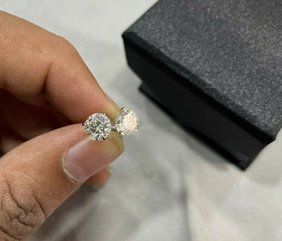 0.10 Ct. Off White Heated & Pressure Treated Diamond 3 Prong Studs in 925 Silver