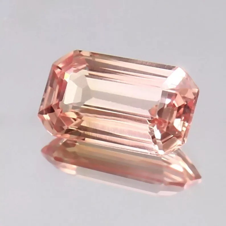 Top Grade Ceylon Padparadscha Sapphire 9.80 Ct Loose Long Emerald Cut Unheated