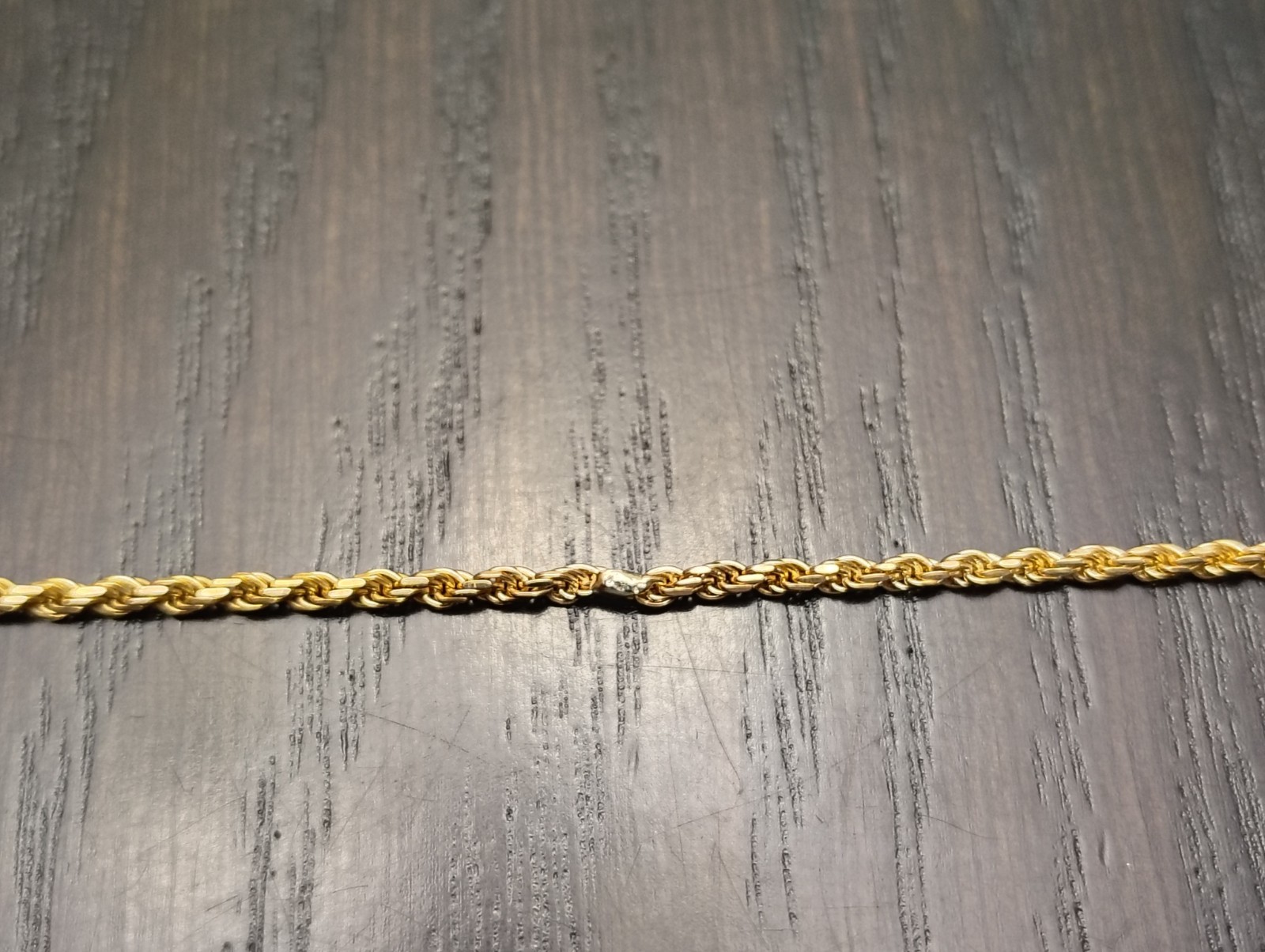 2MM 19 3/4″ 8 GRAMS OF 18K GOLD ROPE CHAIN REPAIRED