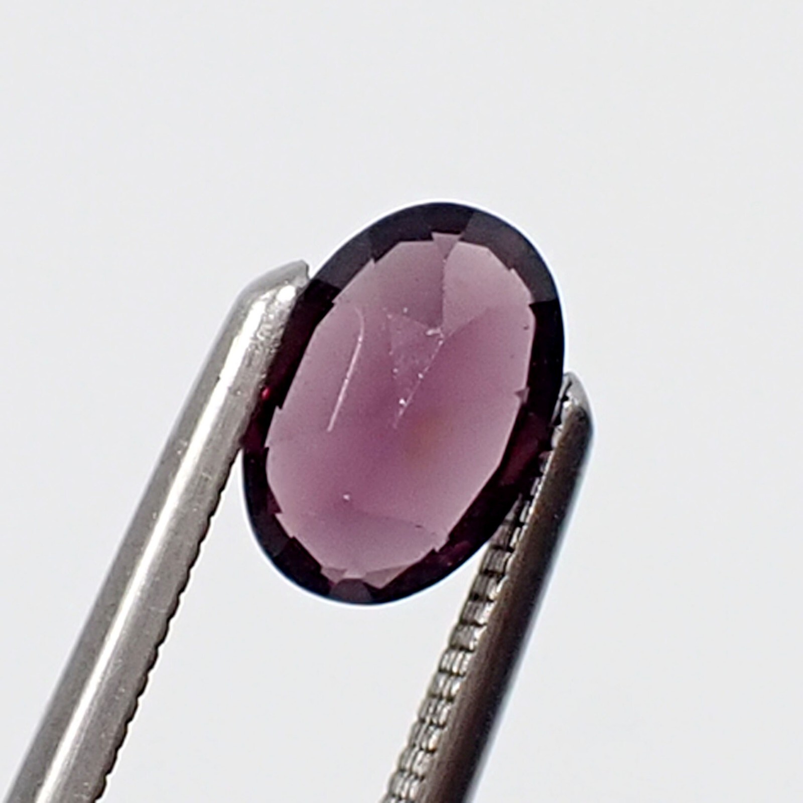 0.68 carat Oval 6x4mm Deep Purple Colour Untreated Natural Spinel Gemstone