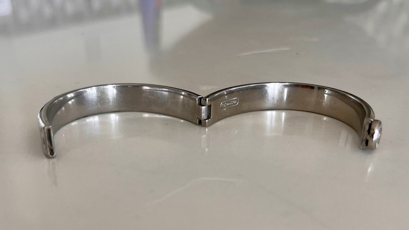 COACH Burgundy Enamel with Silver Accent and Hinged Closure Bangle Bracelet